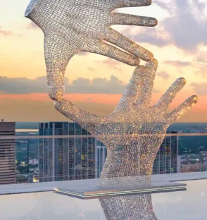 jem-miami-residences-preconstruction-pool-sculpture.webp
